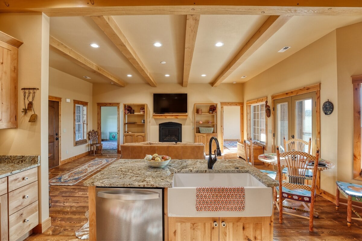 kitchen island with beamed ceiling in wyoming